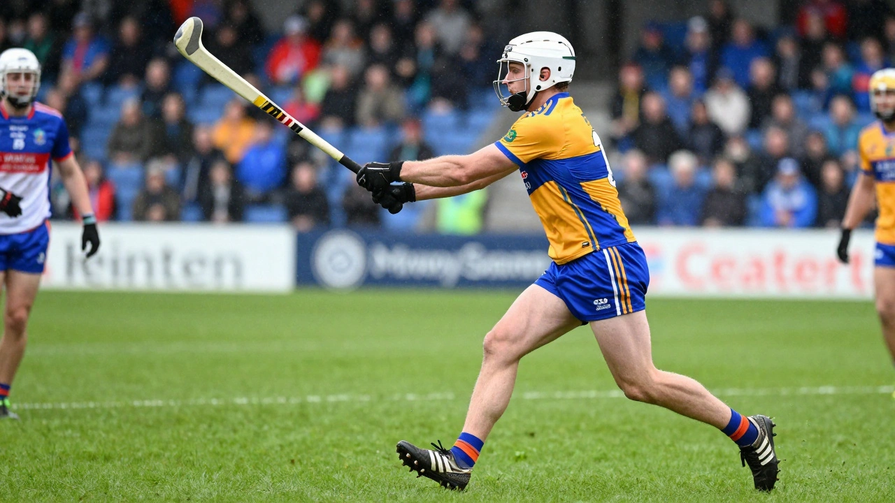 Hurling player in action during rainy match